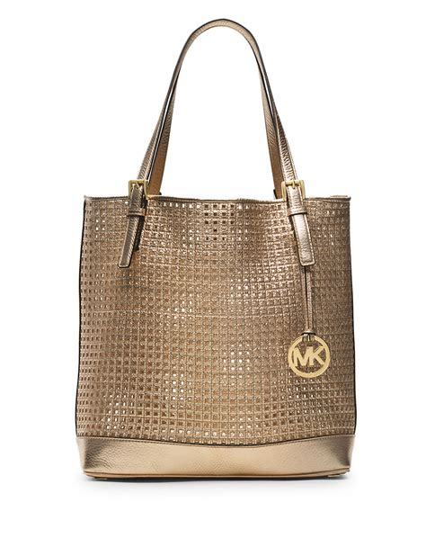 michael kors clutch bag gold|Michael Kors large gold tote.